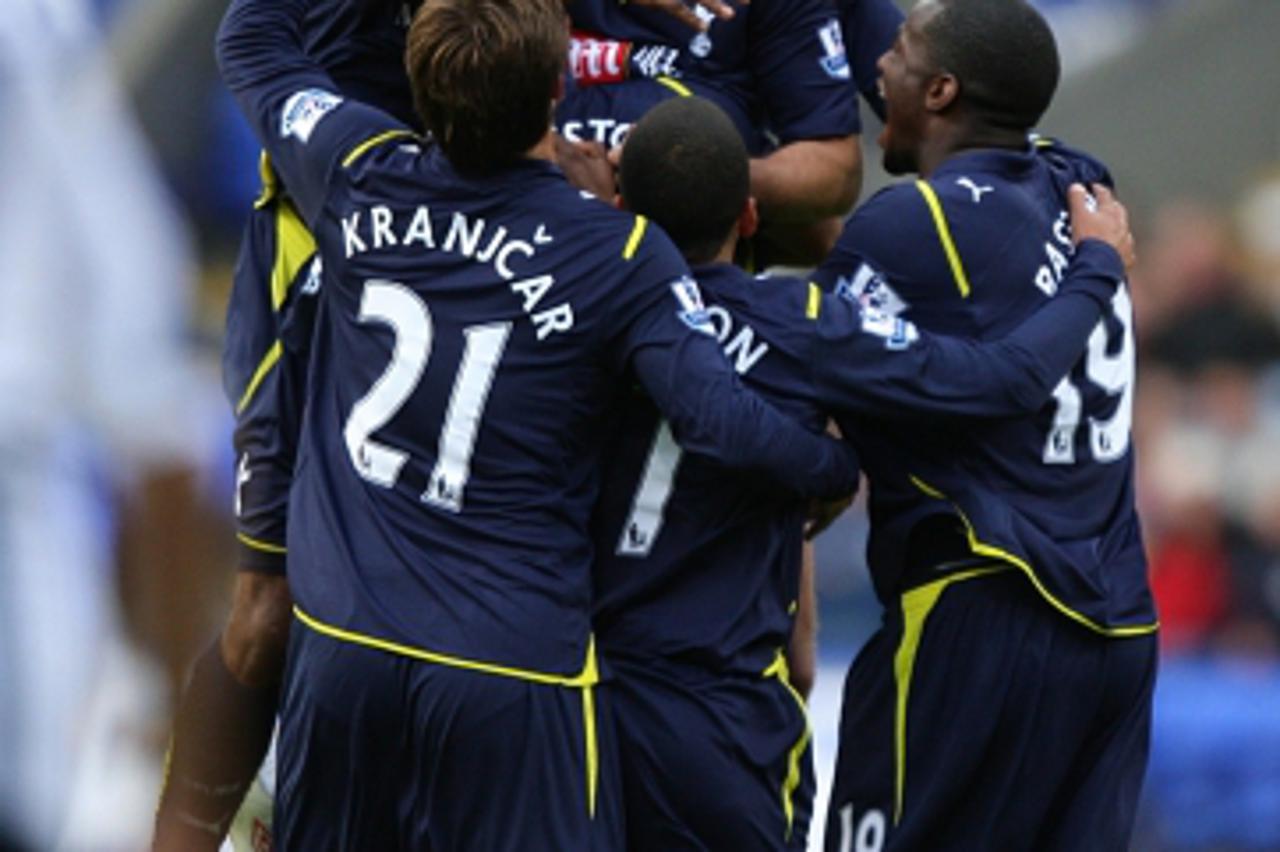 'Tottenham Hotspur\'s Vedran Corluka (top) celebrates scoring his sides second equalising goal Photo: Press Association/Pixsell'