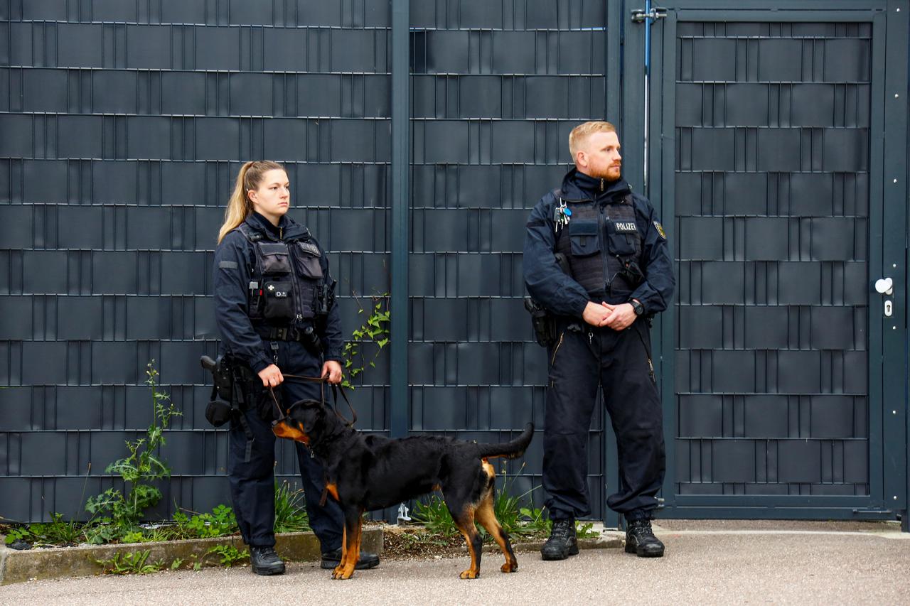 German police officers conduct random checks at a border with France, in Kehl