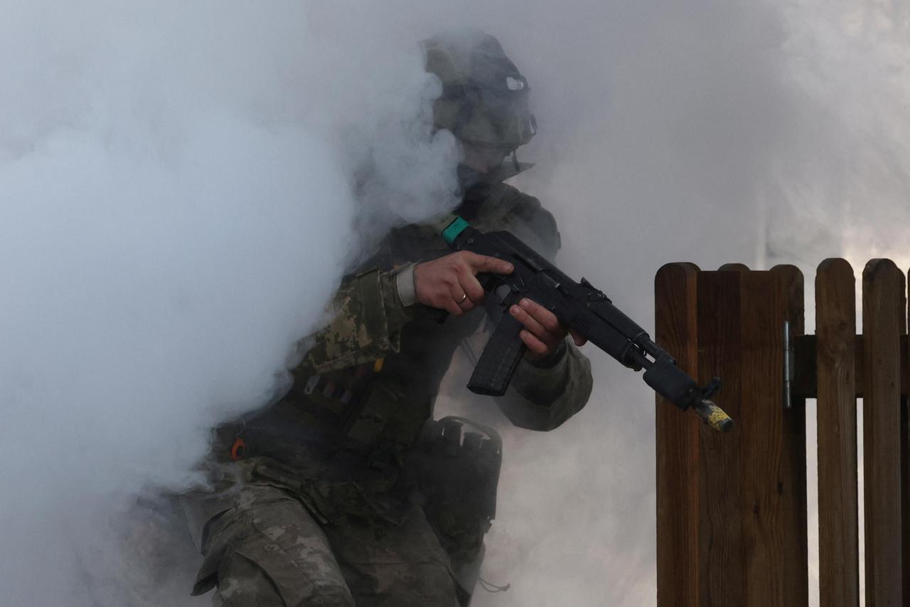 Australian and British armed forces lead an urban battle exercise for Ukranian soliders at a training facility in East Anglia