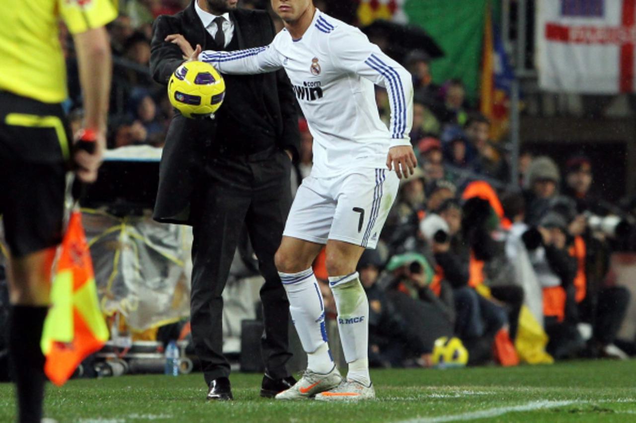 \'30.11.2010. Camp Nou, ESP, FC Barcelona vs Real Madrid, im BIld Barcelona\'s coach Josep Guardiola and Real Madrid\'s Cristiano Ronaldo during la liga match on november 29th 2010 Foto:  Ÿ nph / Greg