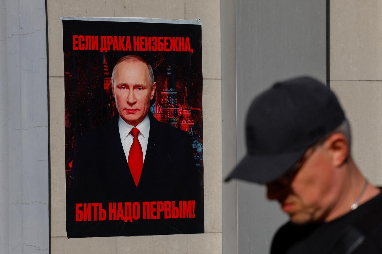 Activists mark Russian President Putin's birthday in Donetsk