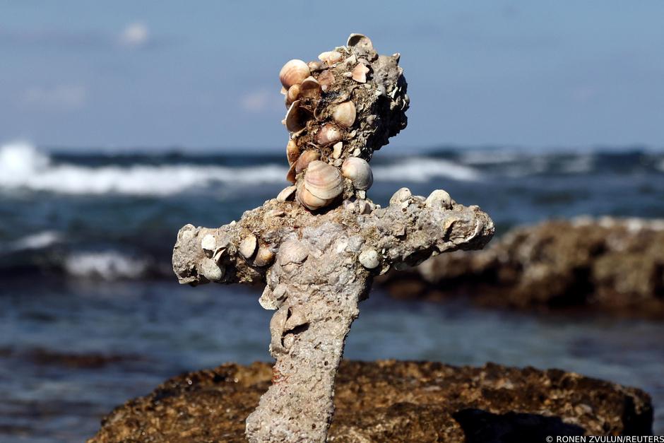 A sword believed to have belonged to a Crusader who sailed to the Holy Land almost a millennium ago was found in Caesarea