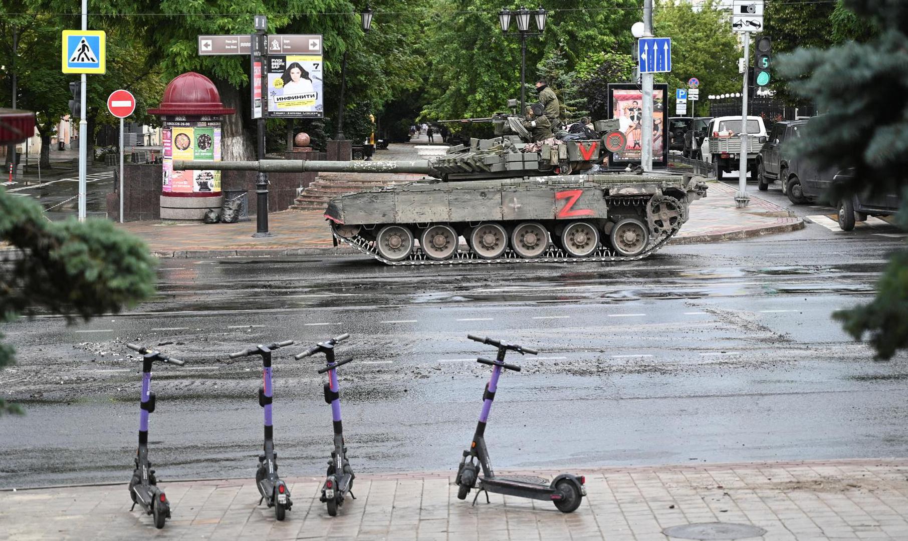 Fighters of Wagner private mercenary group are seen atop of a tank in a street near the headquarters of the Southern Military District in the city of Rostov-on-Don, Russia, June 24, 2023. REUTERS/Stringer Photo: Stringer/REUTERS