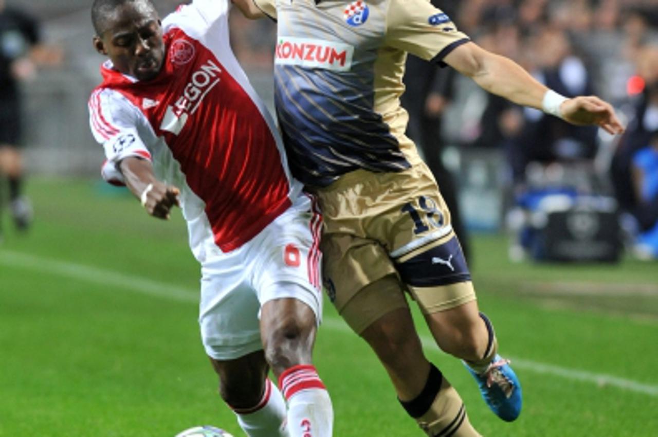 \'02.11.2011., Amsterdam - Amsterdam Arena Stadion - Nogometna utakmica 4. kola UEFA Lige prvaka izmedju Ajaxa i Dinama. Mario Situm, Eyong Enoh.  Photo: Marko Lukunic/PIXSELL\'