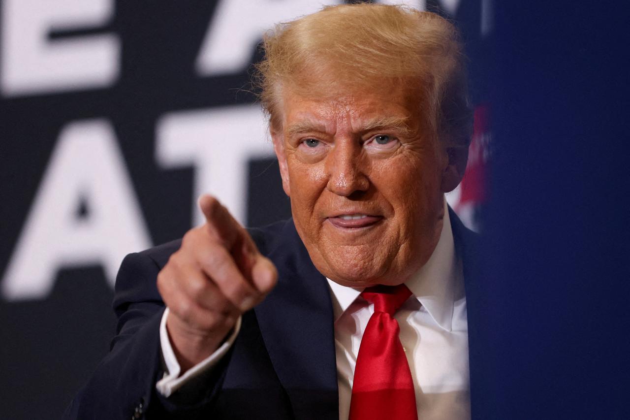 FILE PHOTO: Republican presidential candidate and former U.S. President Trump attends a campaign event in Waterloo, Iowa