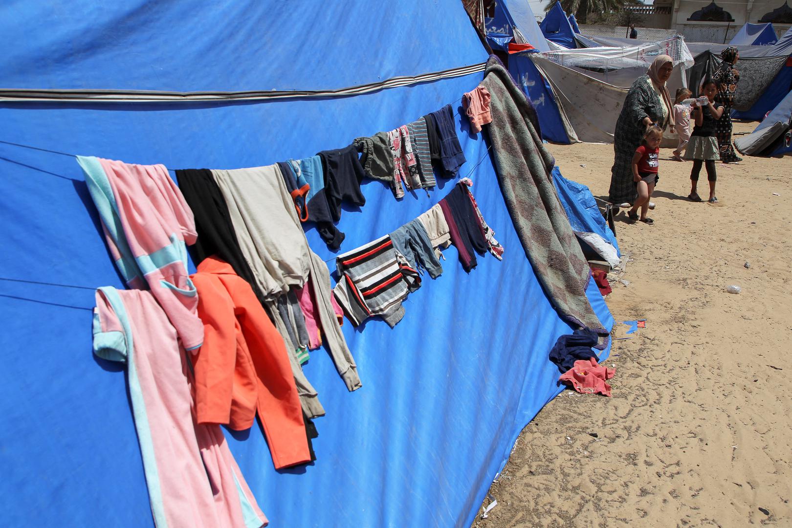 Clothes hang on a washing line, as displaced Palestinians, who fled their houses due to Israeli strikes, shelter at a tent camp, amid the ongoing conflict between Israel and the Palestinian Islamist group Hamas, in Rafah in the southern Gaza Strip, May 5, 2024. REUTERS/Hatem Khaled Photo: HATEM KHALED/REUTERS