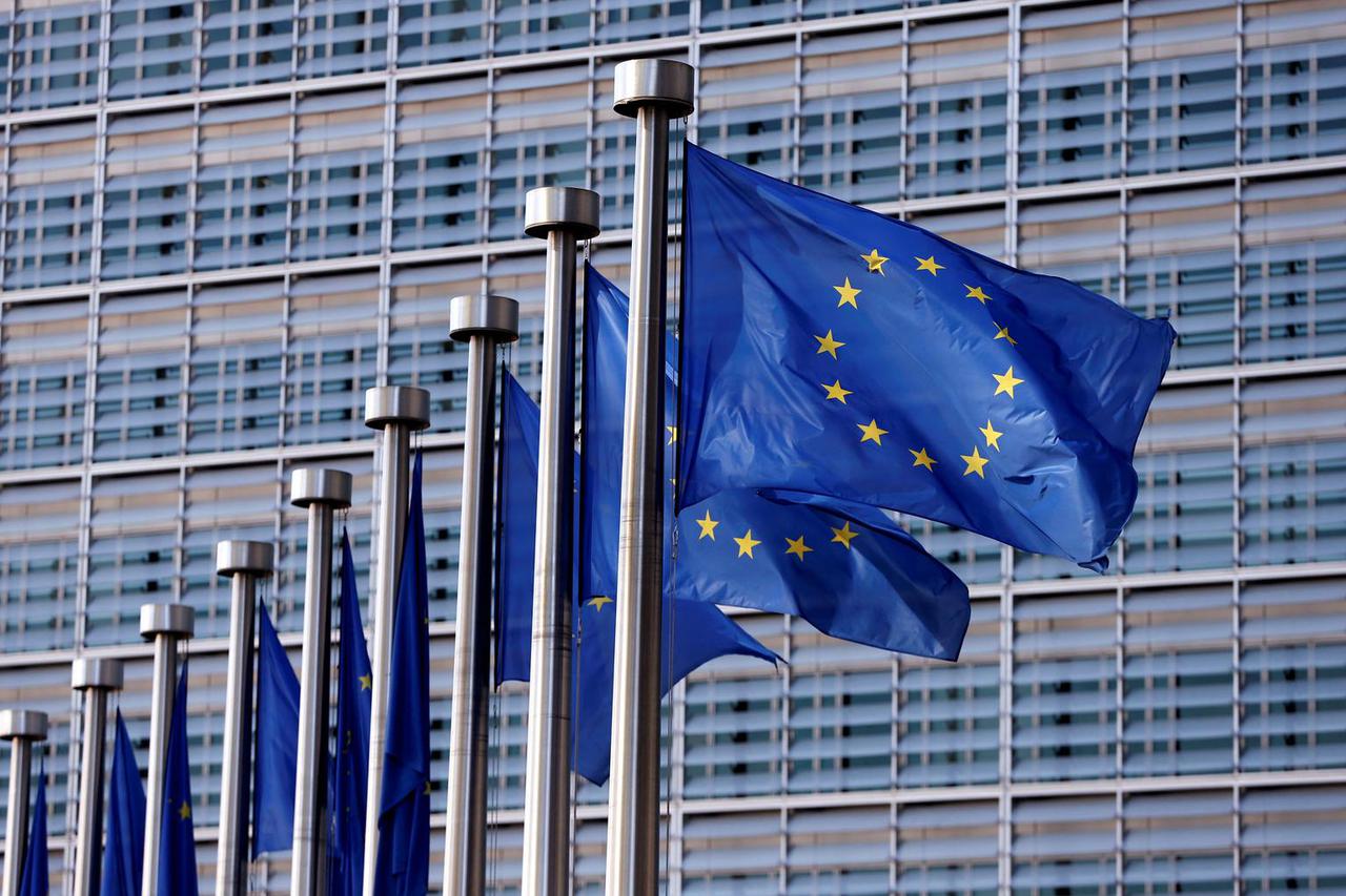 FILE PHOTO: EU flags flutter outside the EU Commission headquarters in Brussels