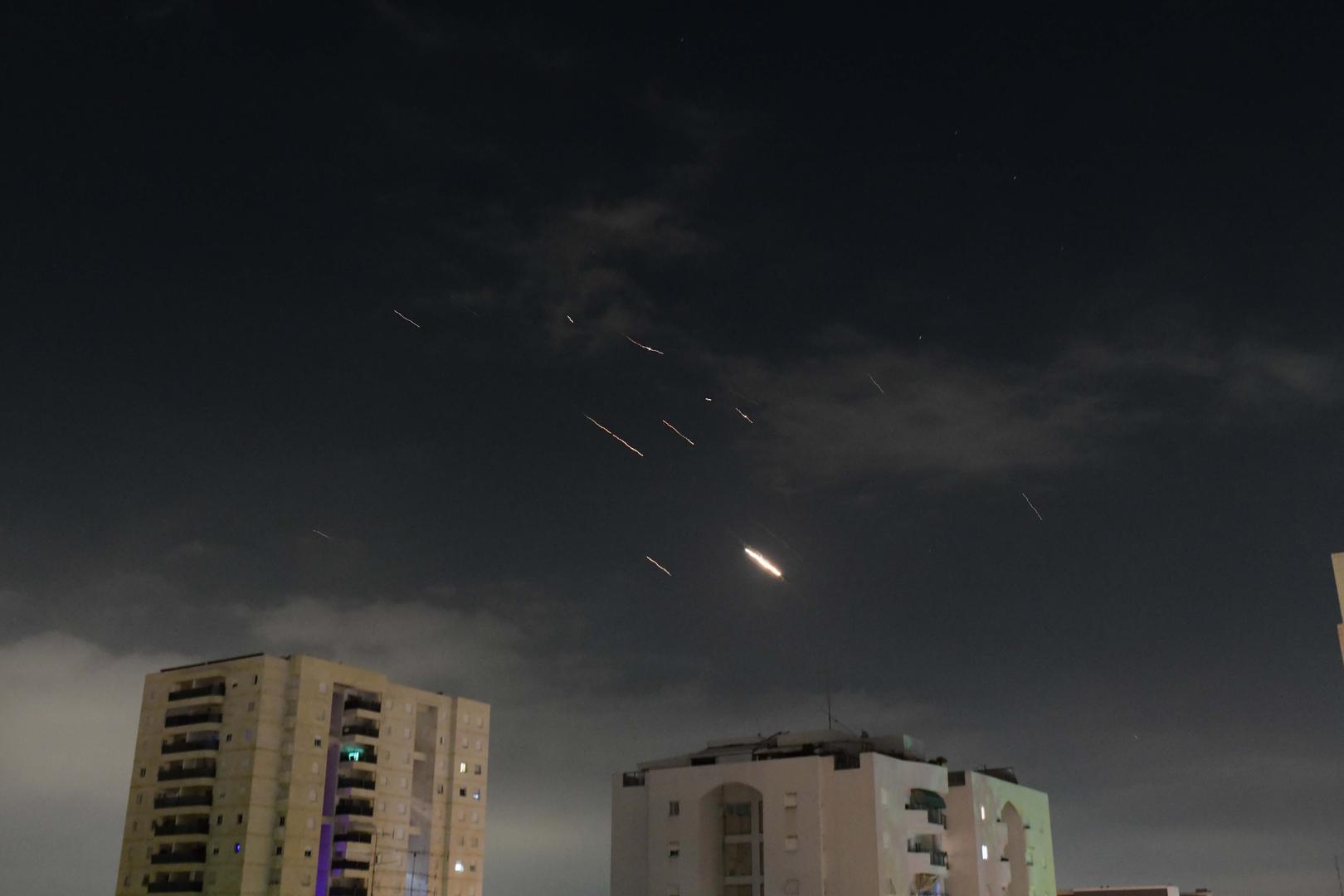 (240414) -- TEL AVIV, April 14, 2024 (Xinhua) -- This photo taken on April 14, 2024 shows flares from explosions in the sky over Tel Aviv as Israel's anti-missile system intercepts missiles and drones from Iran. A combined attack of dozens of ballistic missiles and hundreds of drones from Iran triggered air raid alerts across Israel early on Sunday, the Israeli army said, as residents reported multiple bombings were heard.    Israel Defense Forces (IDF) Spokesman Daniel Hagari confirmed during a press briefing that Israel was under attack by ballistic missiles and unmanned aerial vehicles from Iran, noting that aerial defense systems have intercepted some of the missiles. (Tomer Neuberg/JINI via Xinhua) Photo: Tomer Neuberg/JINI/XINHUA