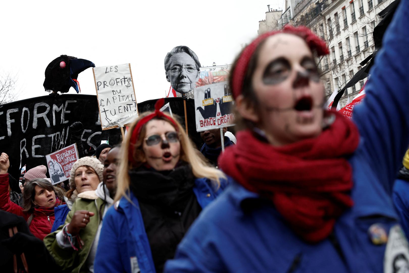 Femimist activists dressed as Rosie the Riveter icon perform during a demonstration against French government's pension reform plan in Paris as part of a day of national strike and protests in France, January 19, 2023.  REUTERS/Benoit Tessier Photo: BENOIT TESSIER/REUTERS