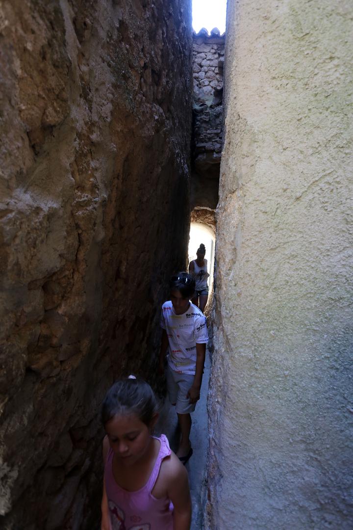 14.07.2020., Vrbnik - Turisticka patrola. Najuza ulica u Vrbniku."nPhoto: Goran Kovacic/PIXSELL