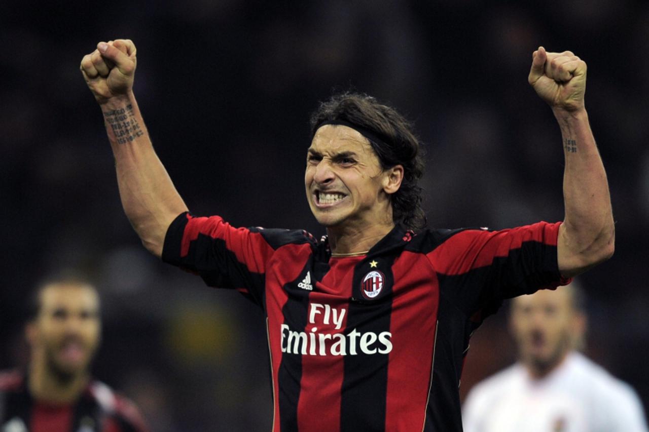 \'AC Milan\'s Swedish forward Zlatan Ibrahimovic celebrates after scoring against Palermo during their Italian Serie A match on November 10, 2010 in San Siro stadium in Milan. AFP PHOTO / OLIVIER MORI