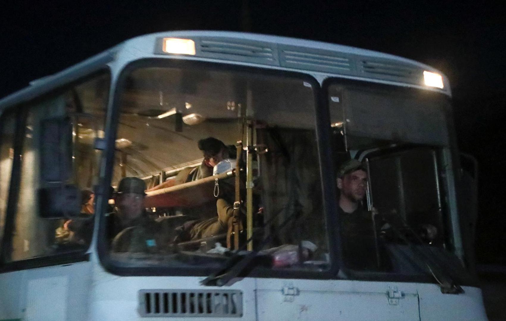 A bus carrying service members of Ukrainian forces from the besieged Azovstal steel mill drive away under escort of the pro-Russian military in the course of Ukraine-Russia conflict in Mariupol, Ukraine May 16, 2022. REUTERS/Alexander Ermochenko Photo: Alexander Ermochenko/REUTERS