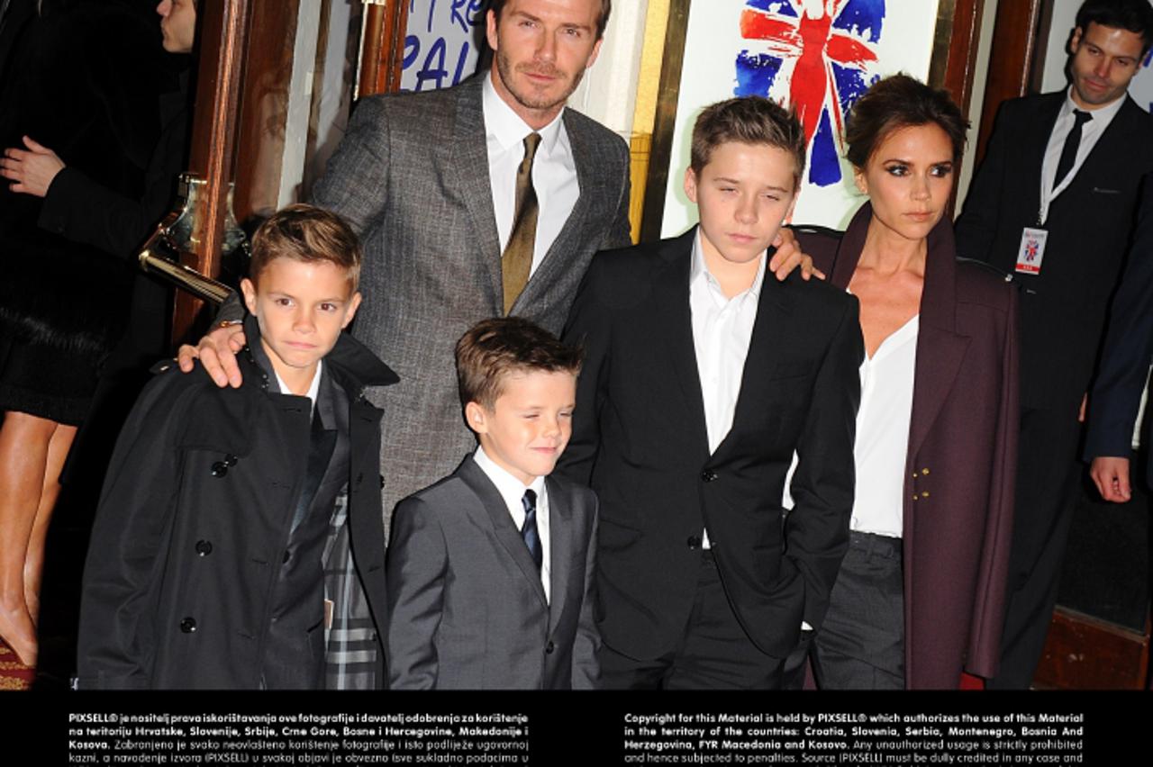 'David and Victoria Beckham with their children (L-R) Romeo, Cruz and Brooklyn arriving for the press night of Viva Forever at the Piccadilly Theatre, Denman Street, London.Photo: Press Association/PI