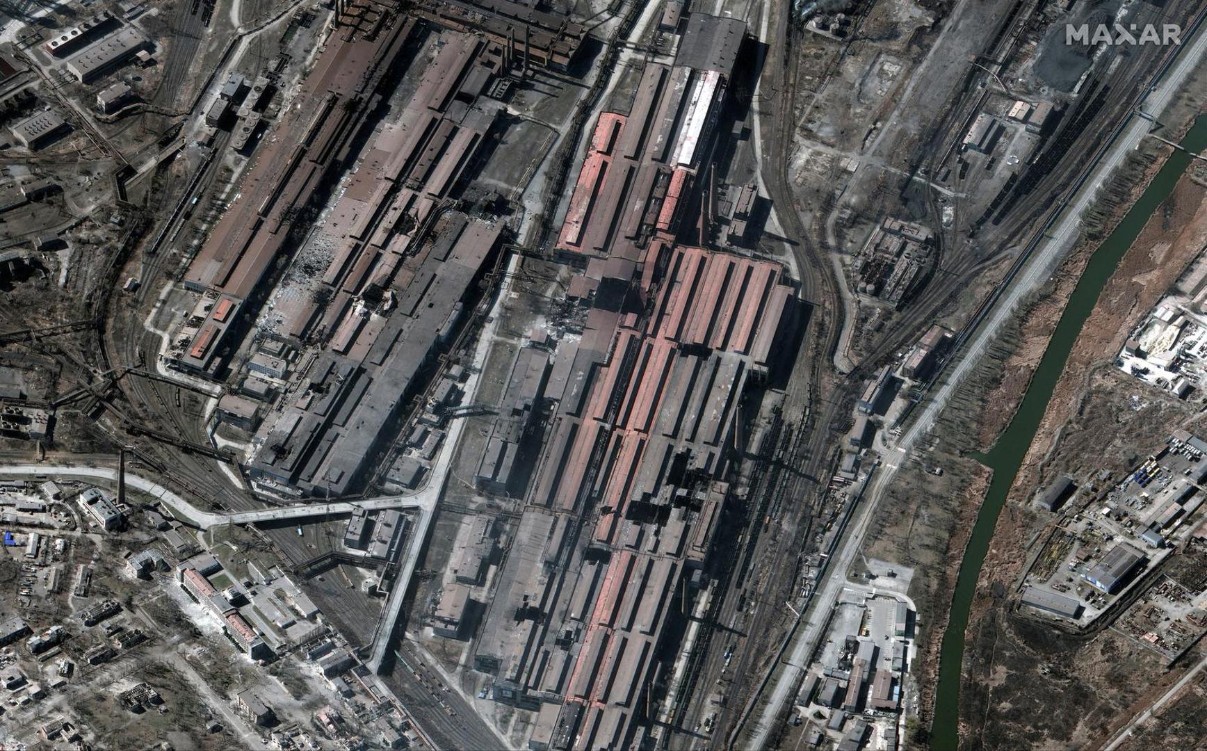 A satellite image shows an overview of damaged Azovstal's metallurgical factory buildings, in Mariupol, Ukraine, March 22, 2022. Satellite image ©2022 Maxar Technologies/Handout via REUTERS ATTENTION EDITORS - THIS IMAGE HAS BEEN SUPPLIED BY A THIRD PARTY. MANDATORY CREDIT. NO RESALES. NO ARCHIVES. DO NOT OBSCURE LOGO. Photo: MAXAR TECHNOLOGIES/REUTERS