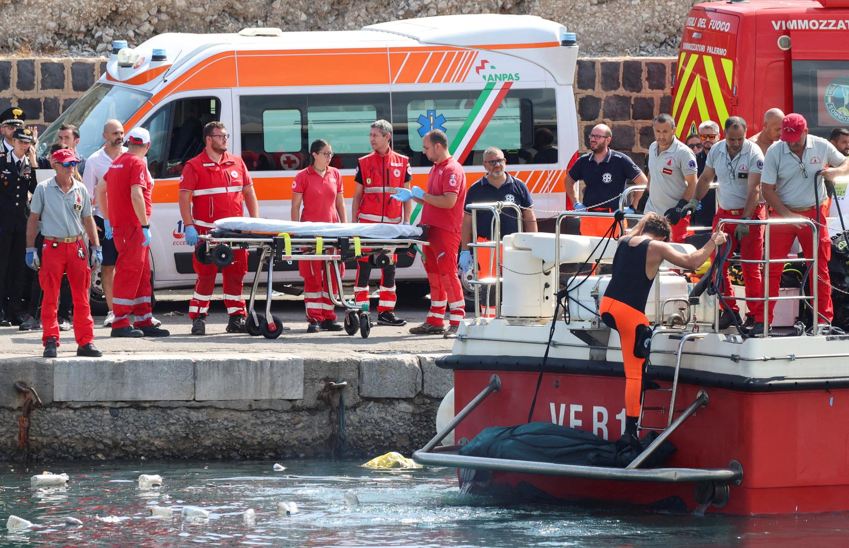 Italian firefighters transport a body bag after a sailboat sank in the early hours of Monday, off the coast of Porticello, near the Sicilian city of Palermo, Italy, August 19, 2024. REUTERS/Igor Petyx REFILE - CORRECTING 'PONTICELLO' TO 'PORTICELLO'. Photo: Igor Petyx/REUTERS