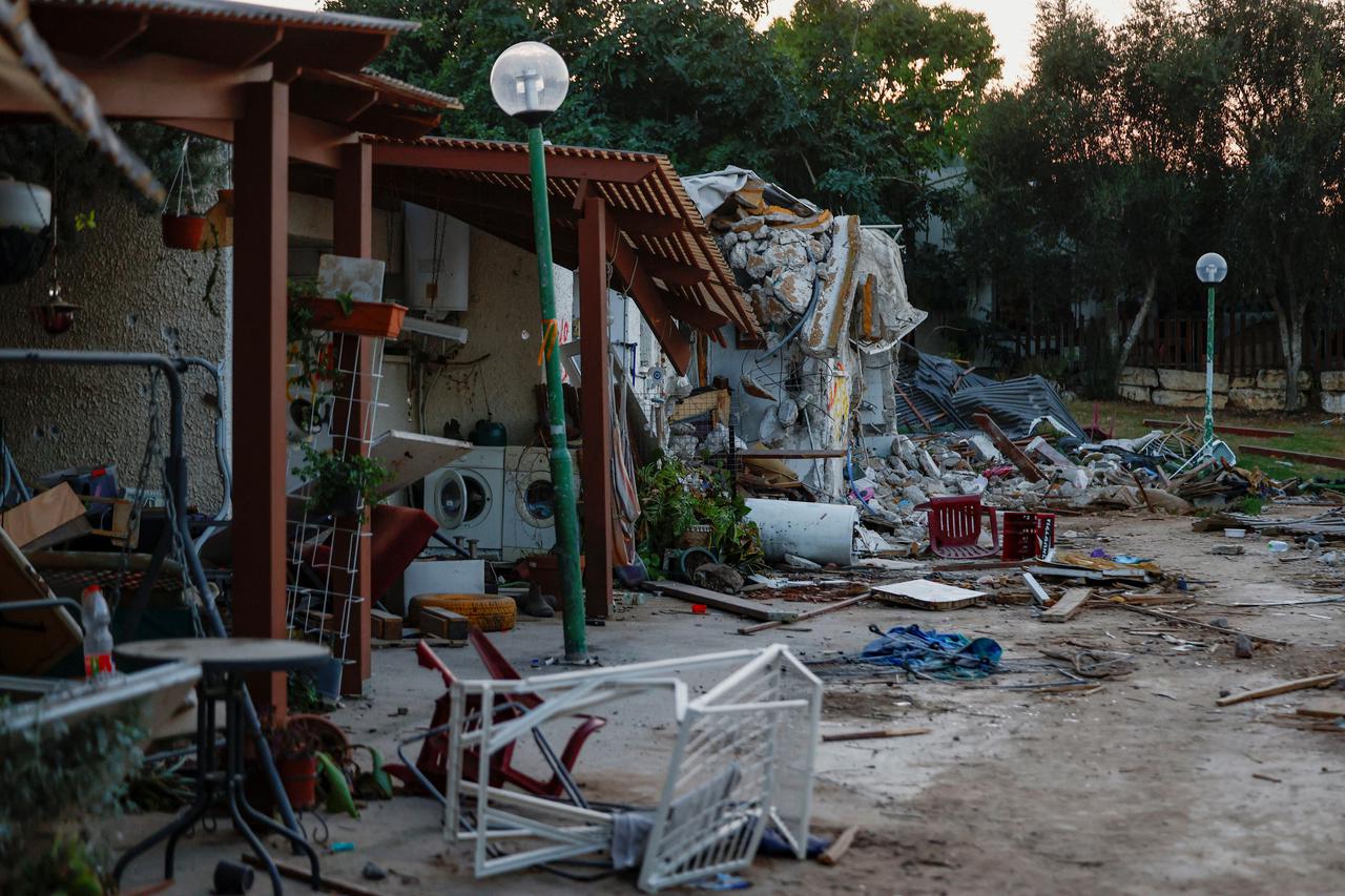 Damage is pictured in Kibbutz Kfar Aza