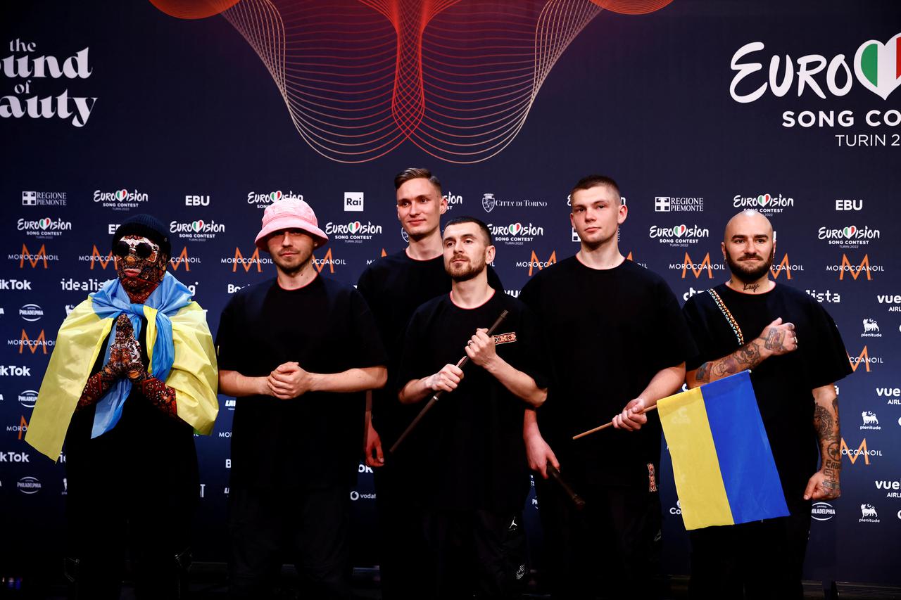 Kalush Orchestra from Ukraine pose for photographers after winning the 2022 Eurovision Song Contest