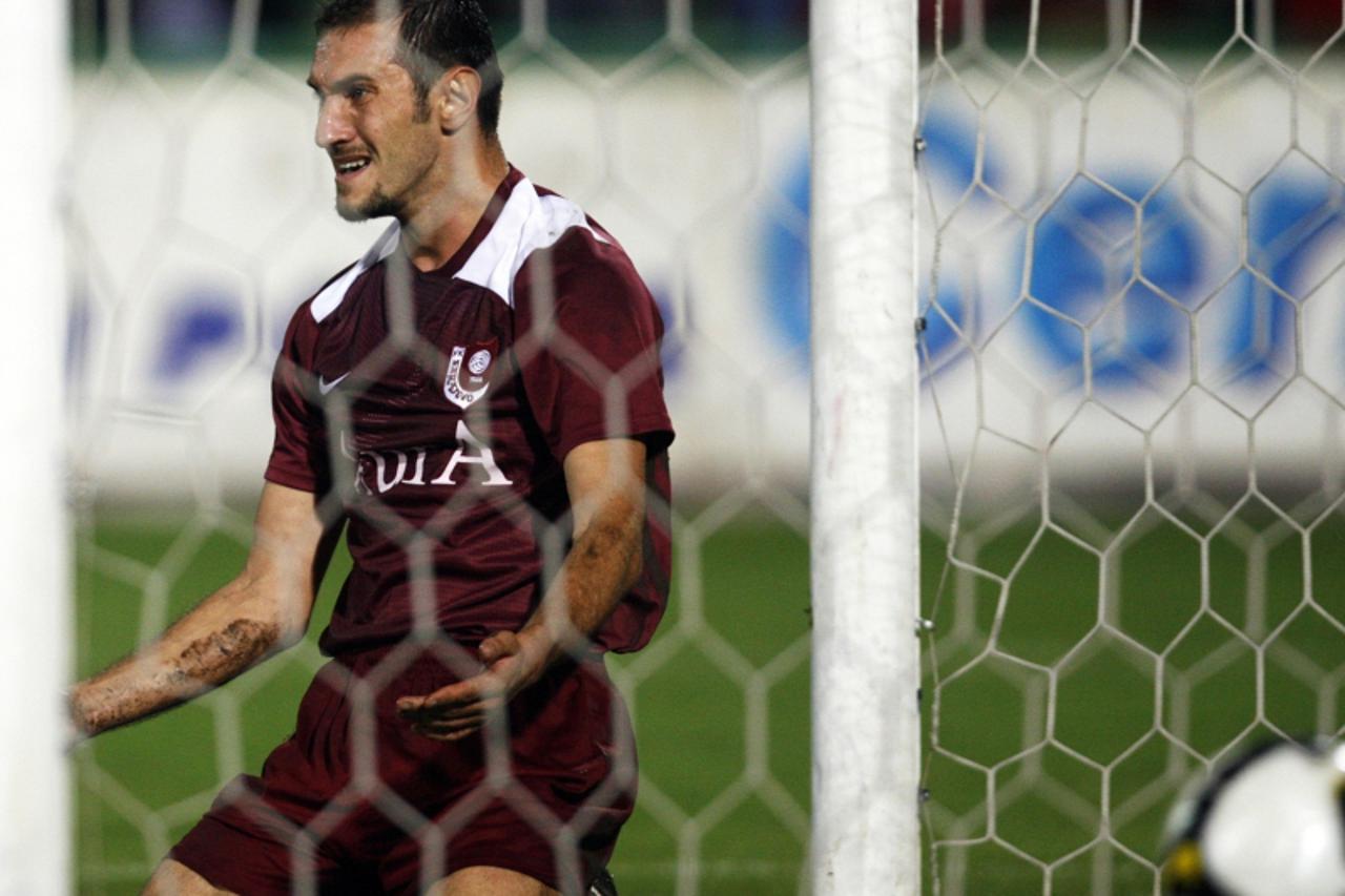 'Alen Avdic of FK Sarajevo reacts during their UEFA Europa League qualifying soccer match against Helsingborg in Sarajevo August 6, 2009.    REUTERS/Damir Sagolj   (BOSNIA AND HERZEGOVINA SPORT SOCCER