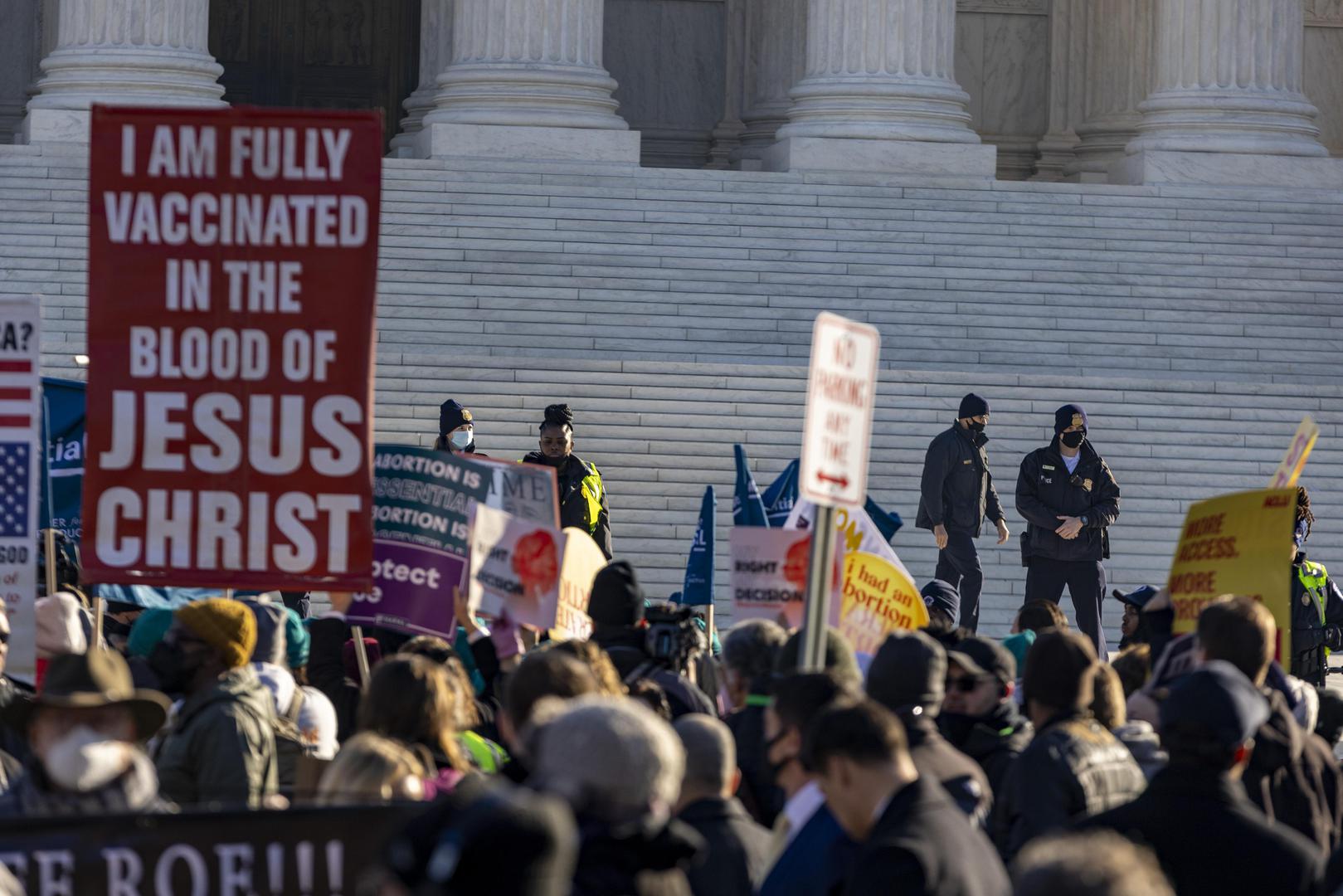 Protesters gather at the Supreme Court in Washington, D.C. on Wednesday, December 1, 2021. The court heard today the case Dobbs v. Jackson Women's Health Organization on the Mississippi law that bans nearly all abortions after 15 weeks. It is expected to be a direct challenge to the 1973 decision to  Roe v. Wade landmark case.    Photo by Tasos Katopodis/UPI . Photo via Newscom