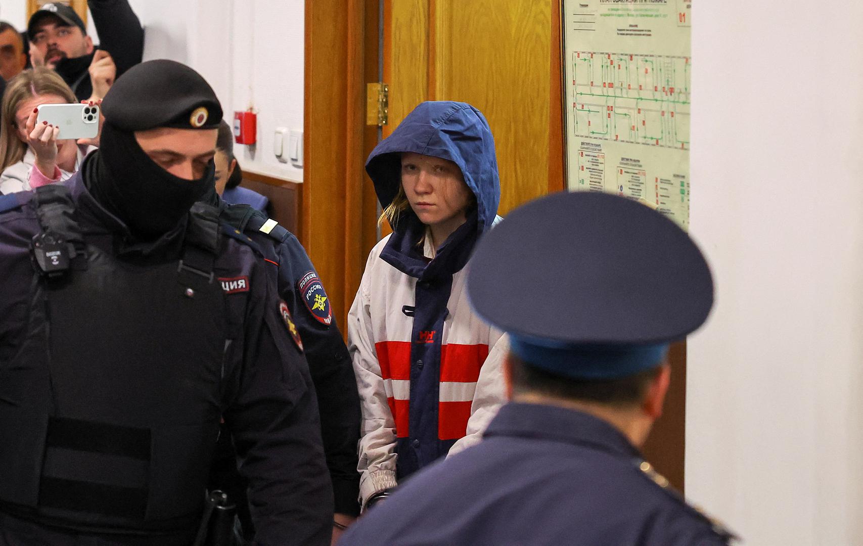 Darya Trepova, who is suspected of the killing of Russian military blogger Maxim Fomin widely known by the name of Vladlen Tatarsky, is escorted inside a court building before a hearing in Moscow, Russia, April 4, 2023. REUTERS/Evgenia Novozhenina Photo: EVGENIA NOVOZHENINA/REUTERS