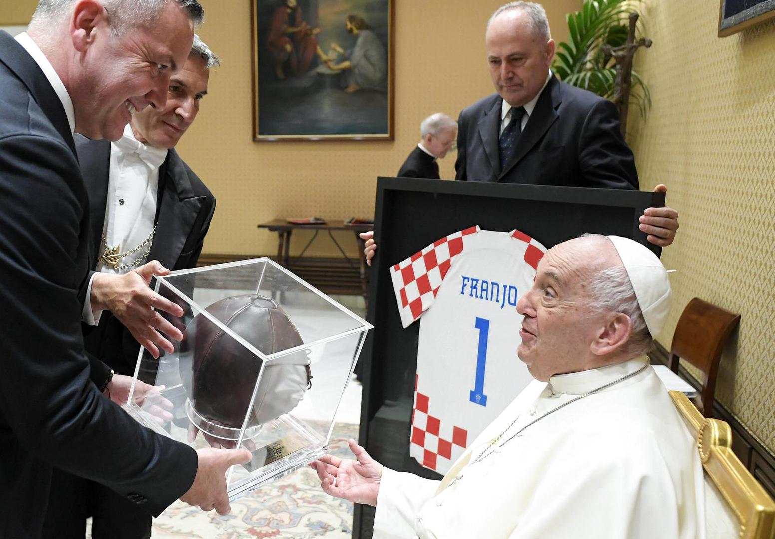 The president of Croatian Football Federation, Marijan Kustic, presents the Pope Francis with a symbolic gift, a Croatian national team jersey during a meeting of the pope with the players of the Croatian National Football Team at the Vatican on June 5, 2024. The Pope praised the Croatian team for their achievements, such as their third-place finish at the last World Cup in Qatar. The Croatians also received his blessing ahead of Euro 2024, which will soon be hosted by Germany. Photo: (EV) Vatican Media/ABACAPRESS.COM Photo: ABACA/ABACA