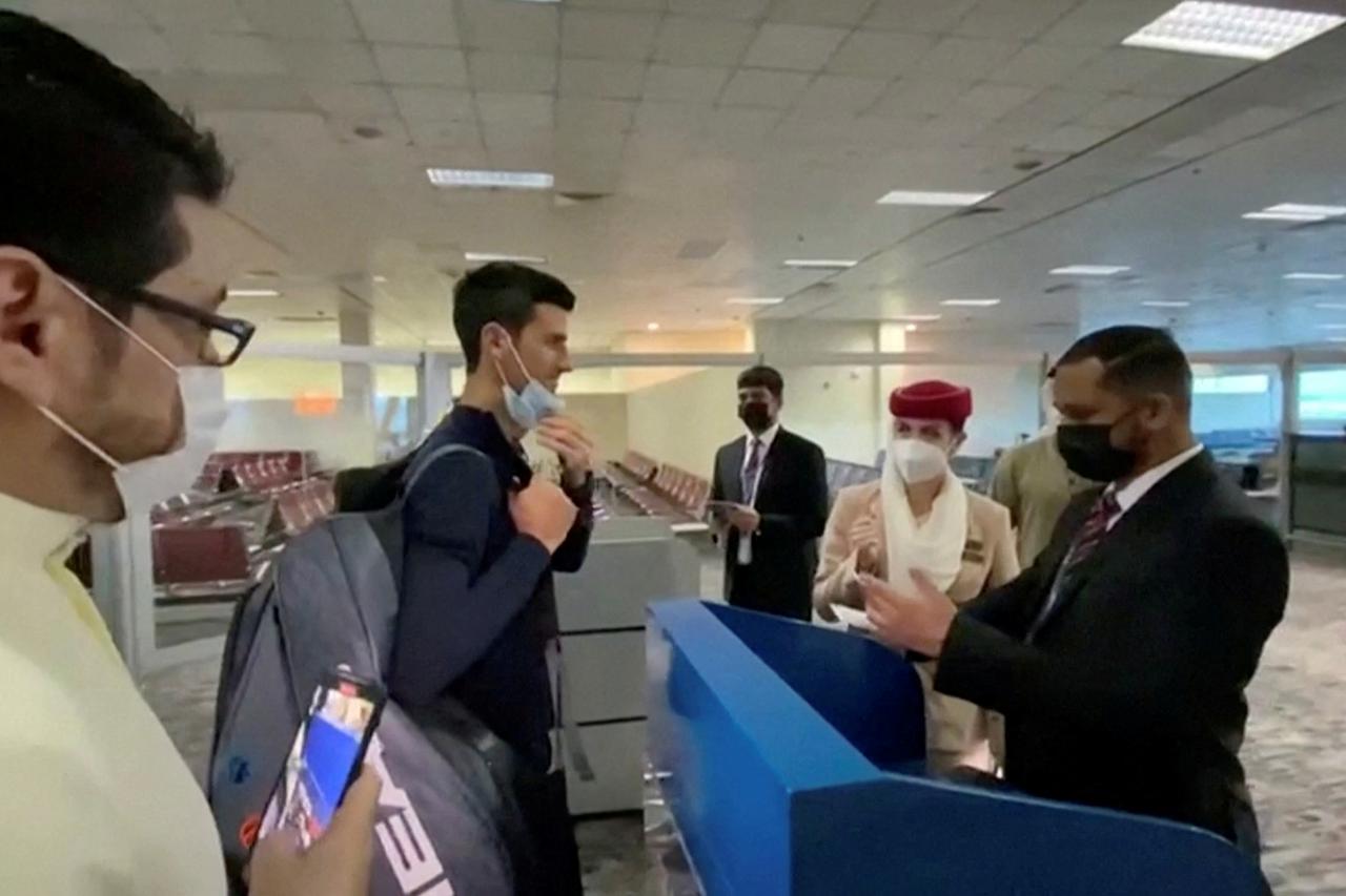 FILE PHOTO: Serbian tennis player Djokovic is seen boarding flight to Belgrade from Dubai airport