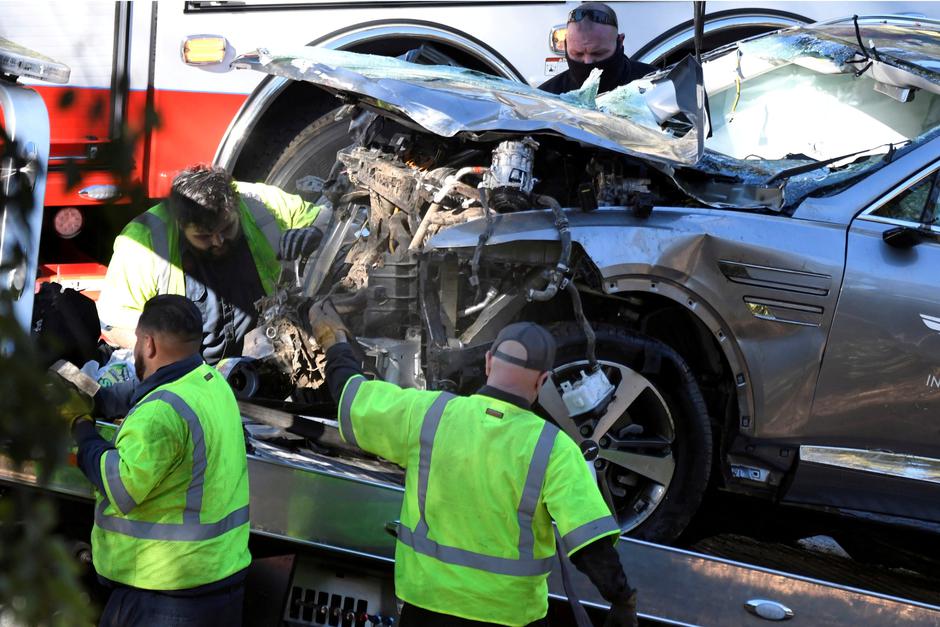 FILE PHOTO: The vehicle of golfer Tiger Woods is loaded onto a recovery truck in Los Angeles