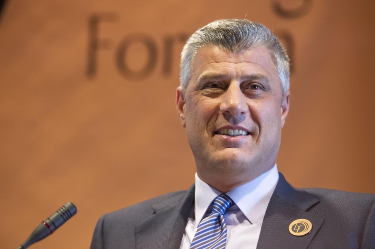 'Kosovo's Prime Minister Hashim Thaci smiles as he attends the Strategic Forum in Slovenia's northern lakeside resort of Bled on September 3, 2012.    AFP PHOTO / JURE MAKOVEC'