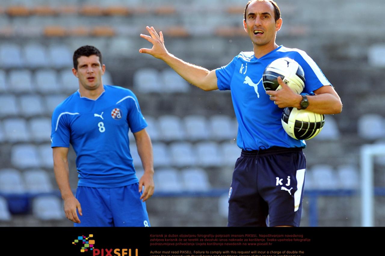 '02.08.2011., Hitrec-Kacijan, Zagreb - Trening nogometasa GNK Dinamo dan prije uzvratne utakmice 3. pretkola Lige Prvaka protiv HJK Helsinkija. Krunoslav Jurcic, trener GNK Dinamo i Fatos Beqiraj.  Ph