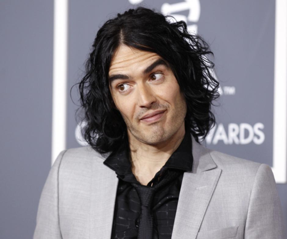 'British actor Russell Brand poses on arrival at the 53rd annual Grammy Awards in Los Angeles, California February 13, 2011. REUTERS/Danny Moloshok (UNITED STATES - Tags: ENTERTAINMENT HEADSHOT) (GRAM