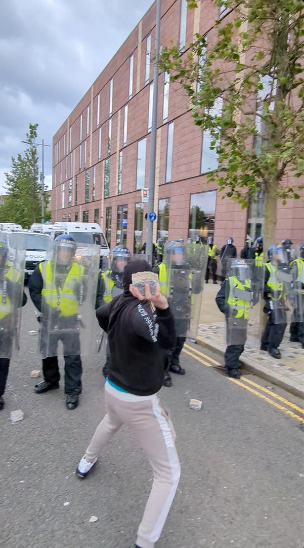 A man throws an object during anti-immigration demonstrations in Sunderland, Britain August 2, 2024 in this still image obtained from a social media video. TikTok @whatsthecracklike/via REUTERS  THIS IMAGE HAS BEEN SUPPLIED BY A THIRD PARTY. MANDATORY CREDIT. NO RESALES. NO ARCHIVES. Photo: @whatsthecracklike/REUTERS