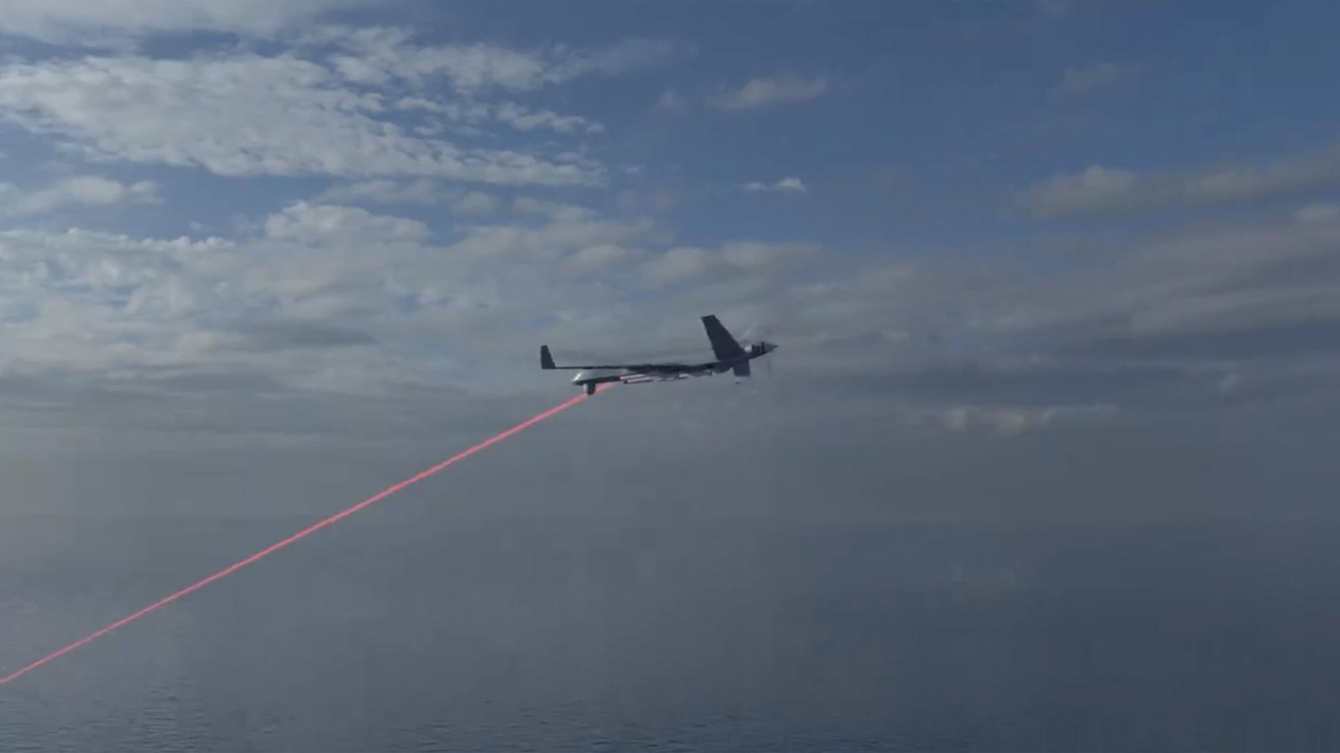 Pictures must credit: MoD A laser weapon which can down aircraft and disable ships has been unveiled by Britain's Ministry of Defence. The £140million GBP DragonFire has been under development since 2017, but now declassified information about it has been released. And it includes footage of the weapon targeting and destroying a drone. The laser consisting of bundled-up glass fibres with their output turned into a single beam. Mounted on a turret, it also has a secondary laser and an electro-optical camera for target acquisition and beam correction. The footage is from a field test at the British Army's Hebrides Range in Scotland in January this year where it tracked and engaged various targets. Graphics were also released showing DragonFire in action aboard a warship where crippling the engines of an enemy boat, blinding one drone and shooting down a second. A larger-scale second generation weapon system is the next project. Picture suplied by JLPPA Photo: JLPPA / Bestimage/BESTIMAGE