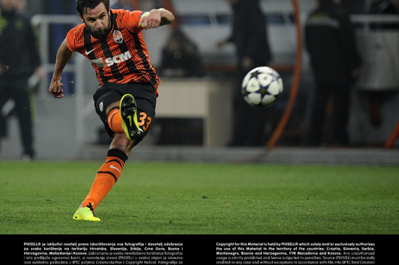 'Darijo Srna of Shakhtar Donetsk scores the 1-0 during the UEFA Champions League round of 16 first leg soccer match between Shakhtar Donetsk and Borussia Dortmund at Donbass Arena in Donetsk, Ukraine,