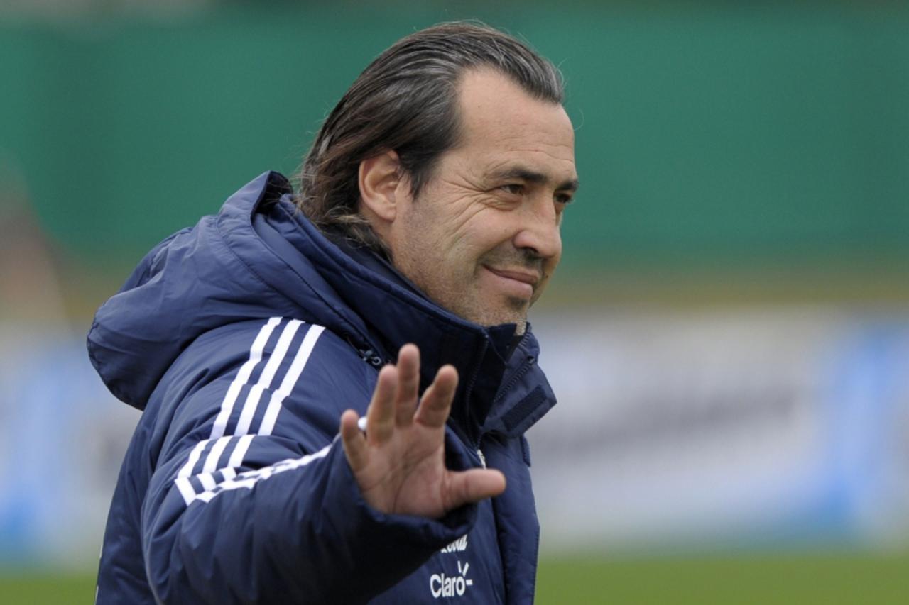 'Argentina\'s coach Sergio Batista waves during a training session of the national team in Ezeiza, Buenos Aires on June 17, 2011, ahead of the Copa America football tournament to be held from July 1 t