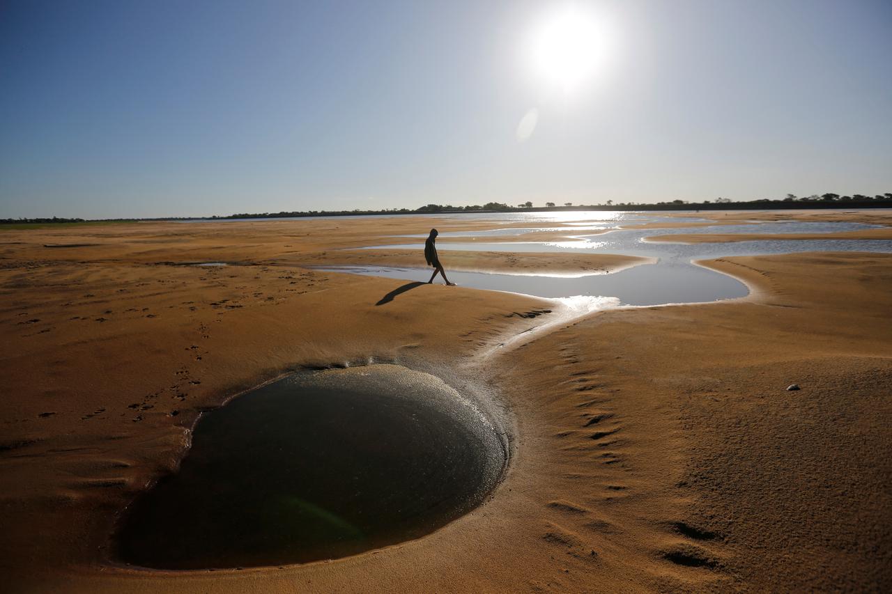 Paraguay's drying river stokes water tensions between fishermen and farmers