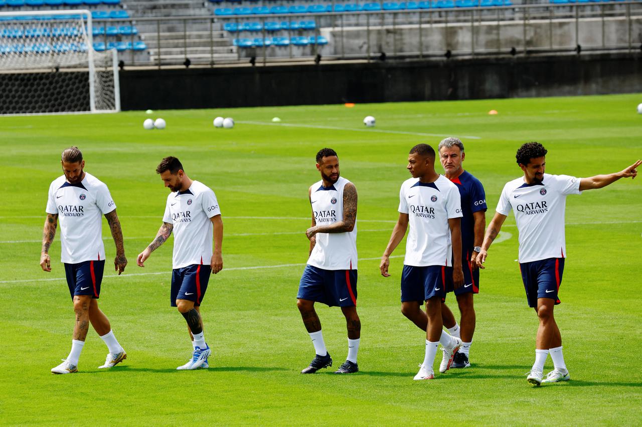 Paris St Germain's players at a kids soccer clinic during the team's tour of Japan, in Tokyo