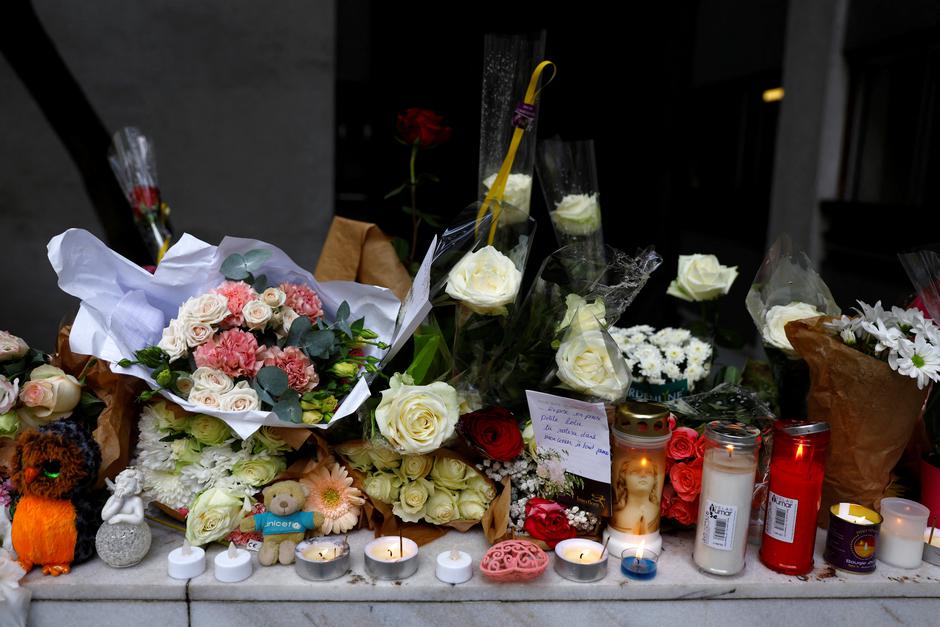 Flowers and messages to pay tribute to a 12-year-old schoolgirl Lola brutally murdered in Paris