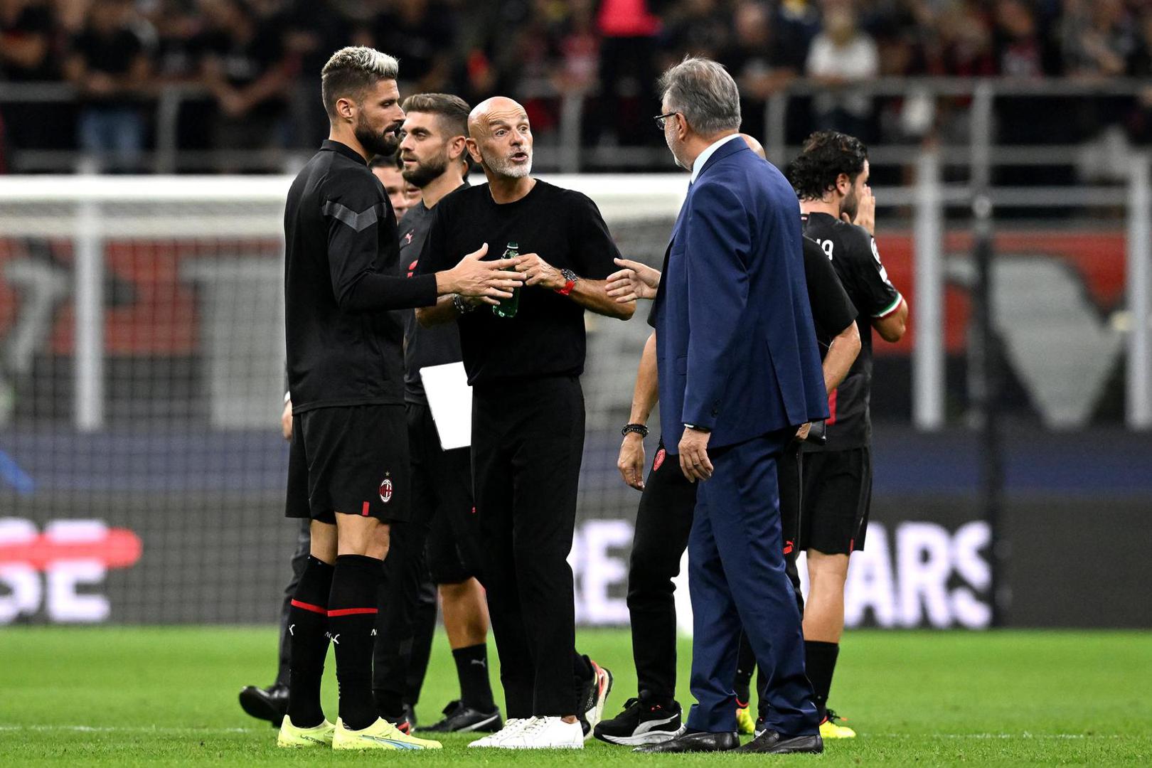 14.09.2022., stadion San Siro, Milano - UEFA Liga prvaka, 2. kolo, skupina E, AC Milan - GNK Dinamo. Ante Cacic, Stefano Pioli, Olivier Giroud Photo: Marko Lukunic/PIXSELL