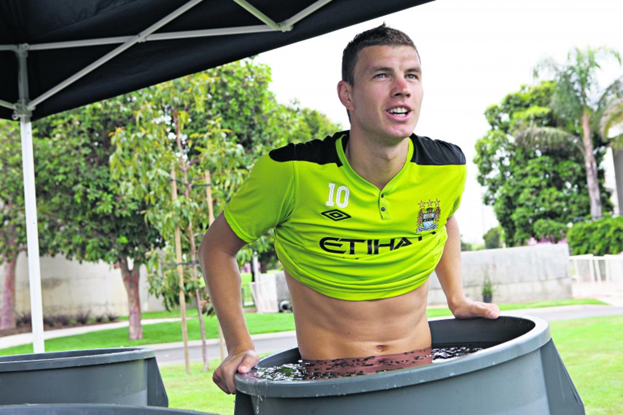 'Manchester City's Edin Dzeko plunges himself into an ice bath Photo: Press Association/Pixsell'