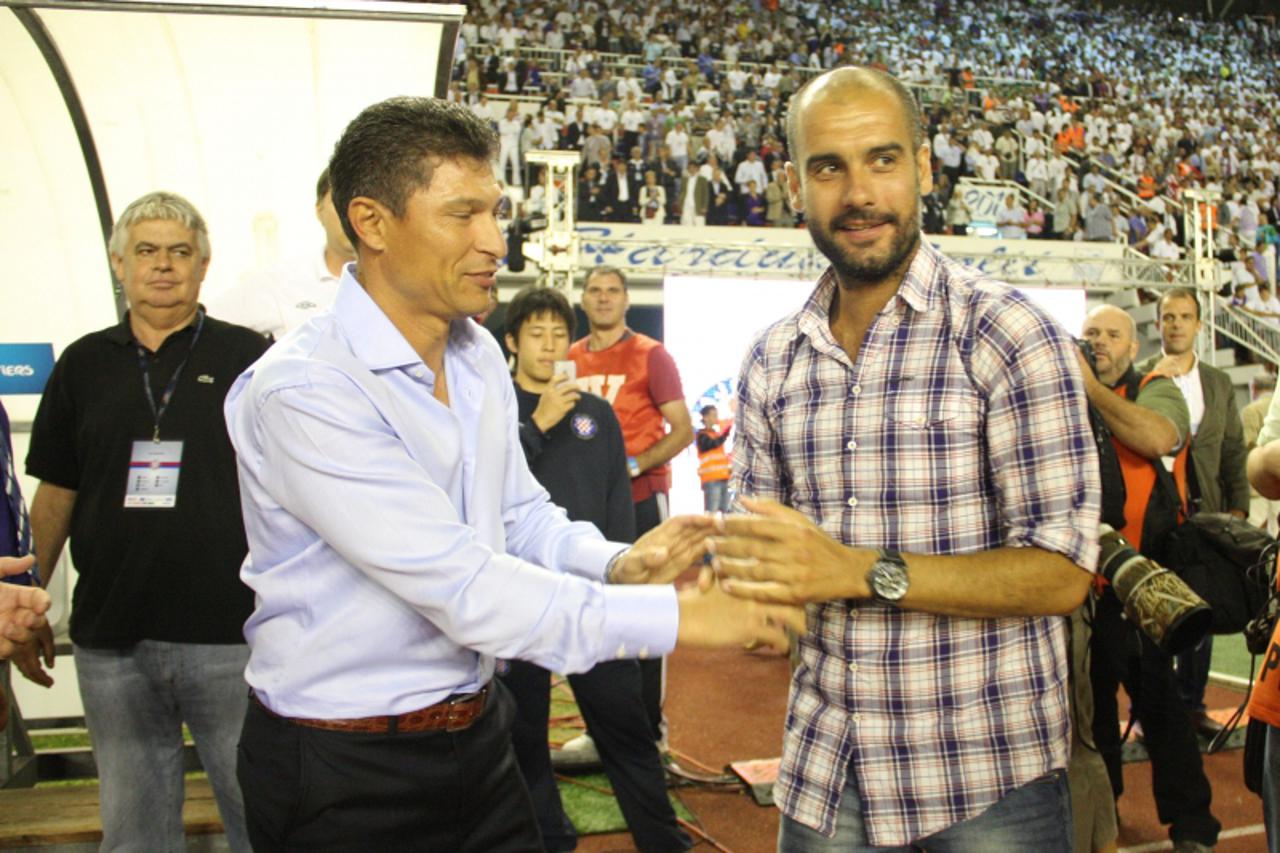 '23.07.2011., Stadion Poljud, Split - Prijateljska nogometna utakmica izmedju NK Hajduk i FC Barcelona odrzana povodom stotog rodjendana Hajduka. Balakov i Guardiola nakon utakmice Photo: Ivana Ivanov