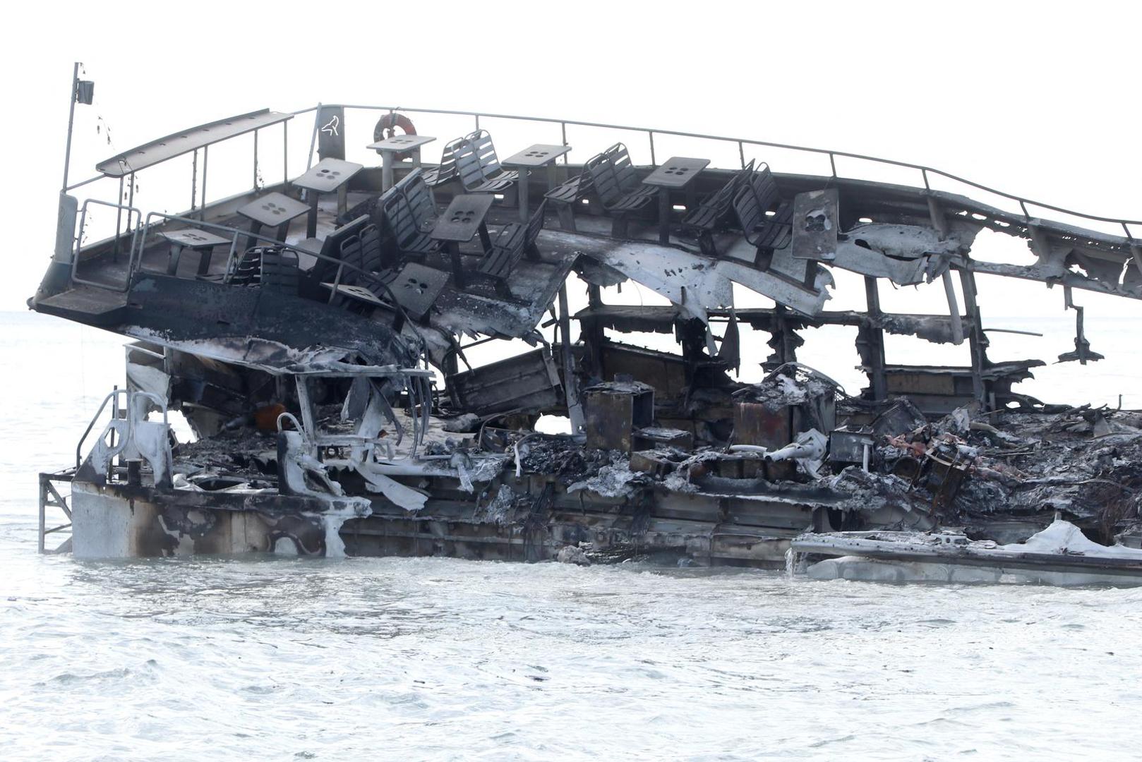 A destroyed boat floats off Lahaina Small Boat Harbor after wildfires driven by high winds burned across most of the town in Lahaina, Maui, Hawaii, U.S. August 10, 2023. Hawai'i Department of Land and Natural Resources/Handout via REUTERS  THIS IMAGE HAS BEEN SUPPLIED BY A THIRD PARTY. Photo: HAWAII DLNR/REUTERS