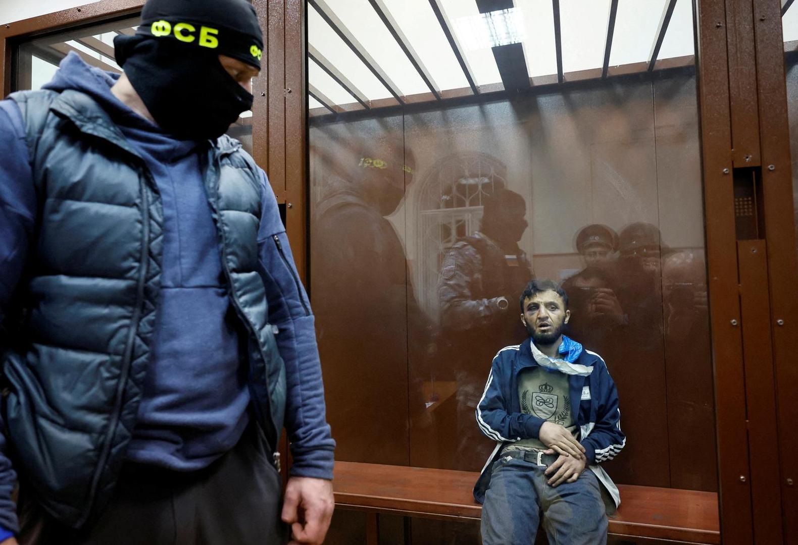 Dalerdzhon Mirzoyev, a suspect in the shooting attack at the Crocus City Hall concert venue, sits behind a glass wall of an enclosure for defendants at the Basmanny district court in Moscow, Russia March 24, 2024. REUTERS/Shamil Zhumatov     TPX IMAGES OF THE DAY Photo: SHAMIL ZHUMATOV/REUTERS