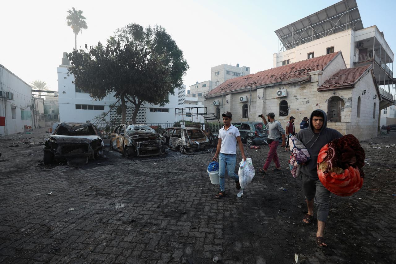 A view shows the site of Israeli strikes on houses in the central Gaza Strip