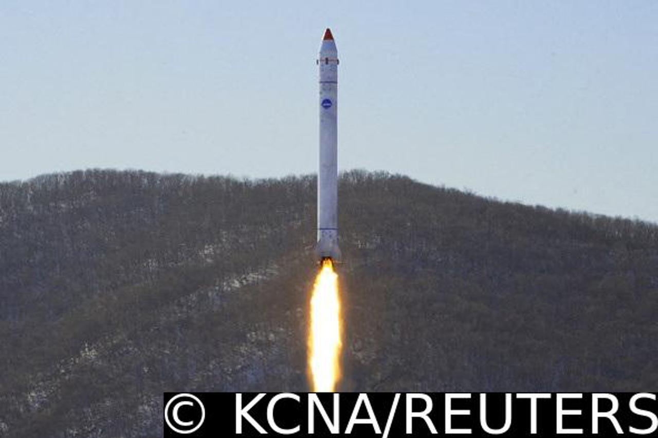 View of what appears to be a test related to the development of a reconnaissance satellite in this undated photo released by KCNA