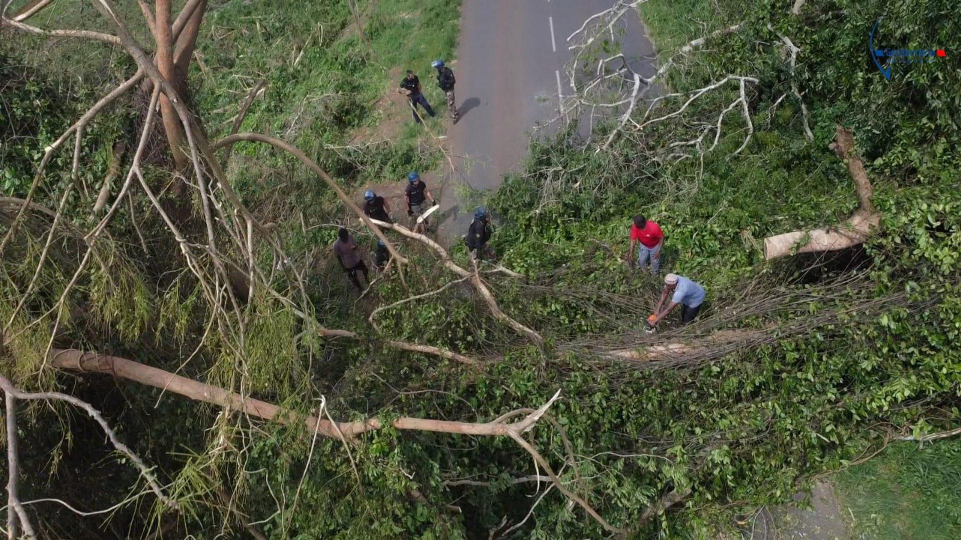 French Gendarmerie forces clear a road in the aftermath of Cyclone Chido, in Mayotte, France, in this picture released December 16, 2024. Gendarmerie Nationale/Handout via REUTERS THIS IMAGE HAS BEEN SUPPLIED BY A THIRD PARTY. NO RESALES. NO ARCHIVES. WATERMARK FROM SOURCE. BEST QUALITY AVAILABLE. Photo: GENDARMERIE NATIONALE/REUTERS