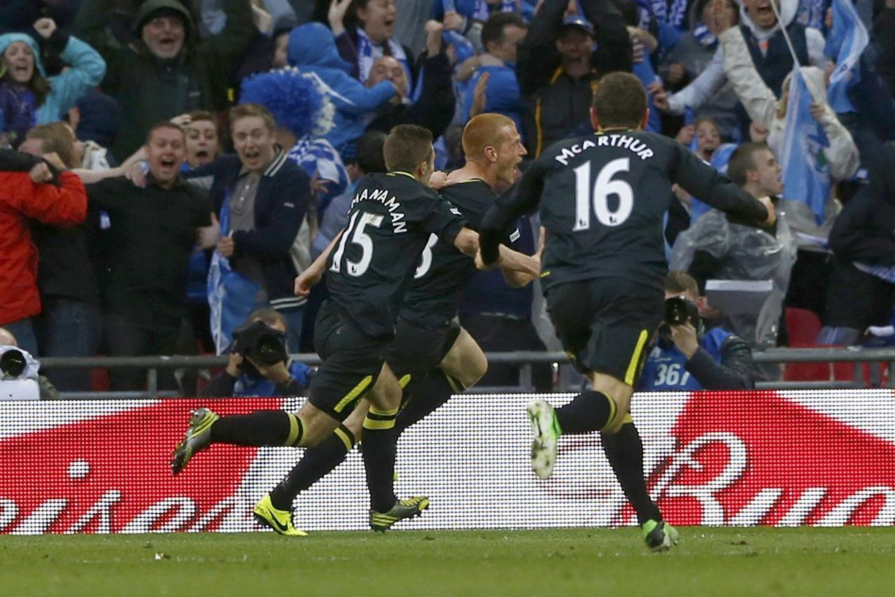 Watson, Wigan - Manchester City (1)