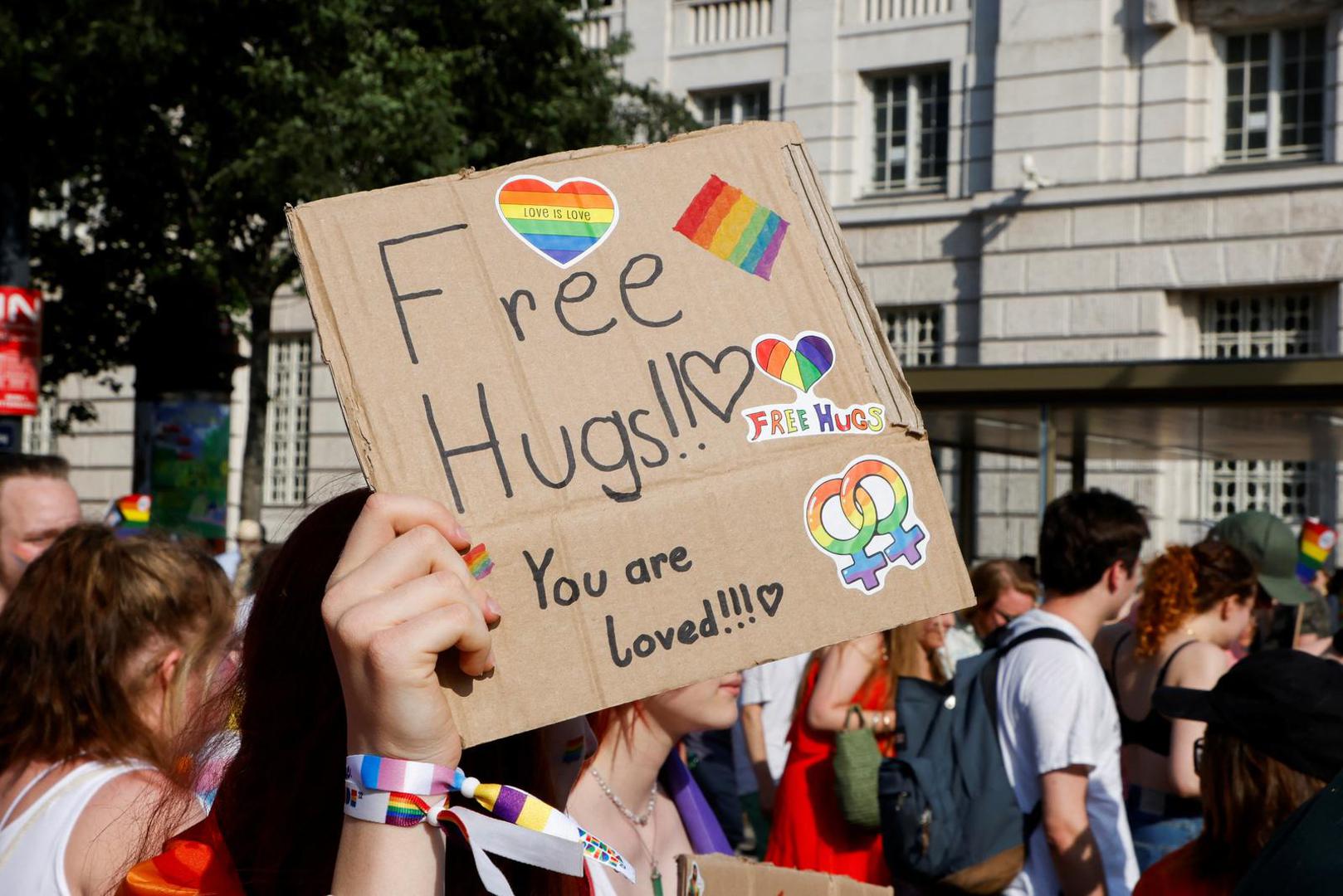 A person holds a placard, as people attend a march to celebrate LGBTQ+ rights at the annual pride parade in Vienna, Austria, June 17, 2023. REUTERS/Leonhard Foeger Photo: LEONHARD FOEGER/REUTERS