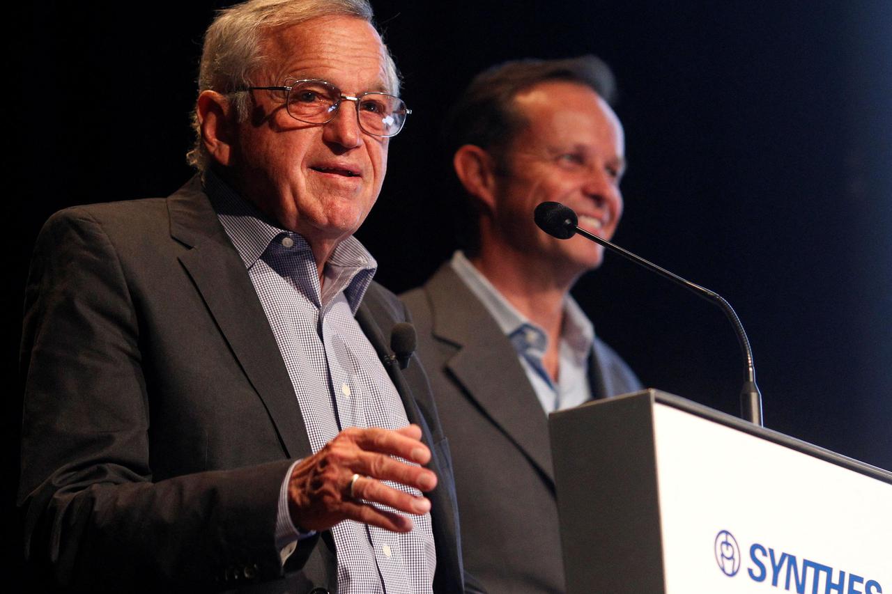 FILE PHOTO: Swiss medical device company Synthes Chairman of the board Wyss speaks next to Synthes CEO Orsinger during the general shareholders meeting in Solothurn