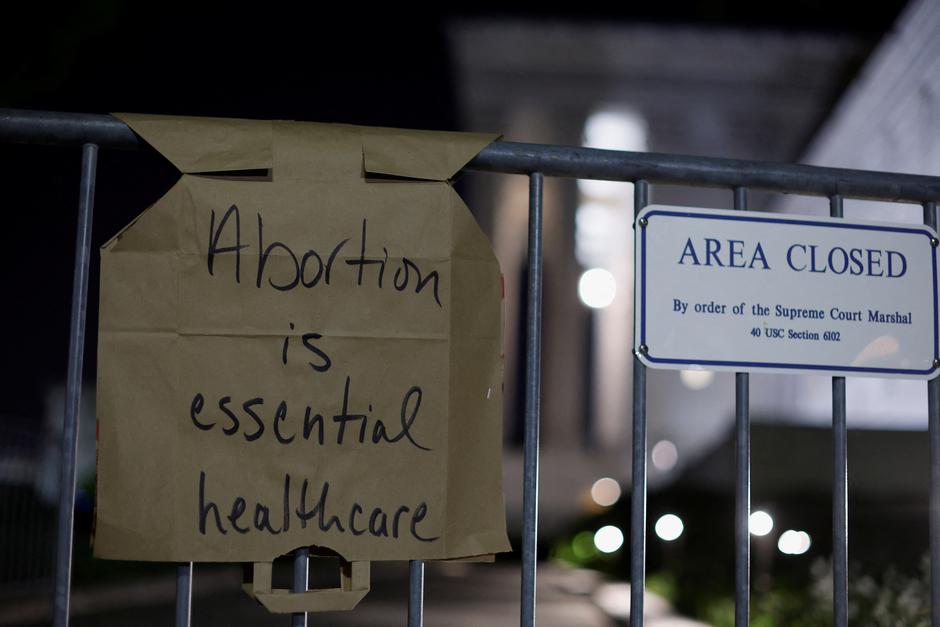 Protesters react outside the U.S. Supreme Court after the leak of a draft opinion preparing for a majority of the court to overturn the Roe v. Wade abortion rights decision in Washington