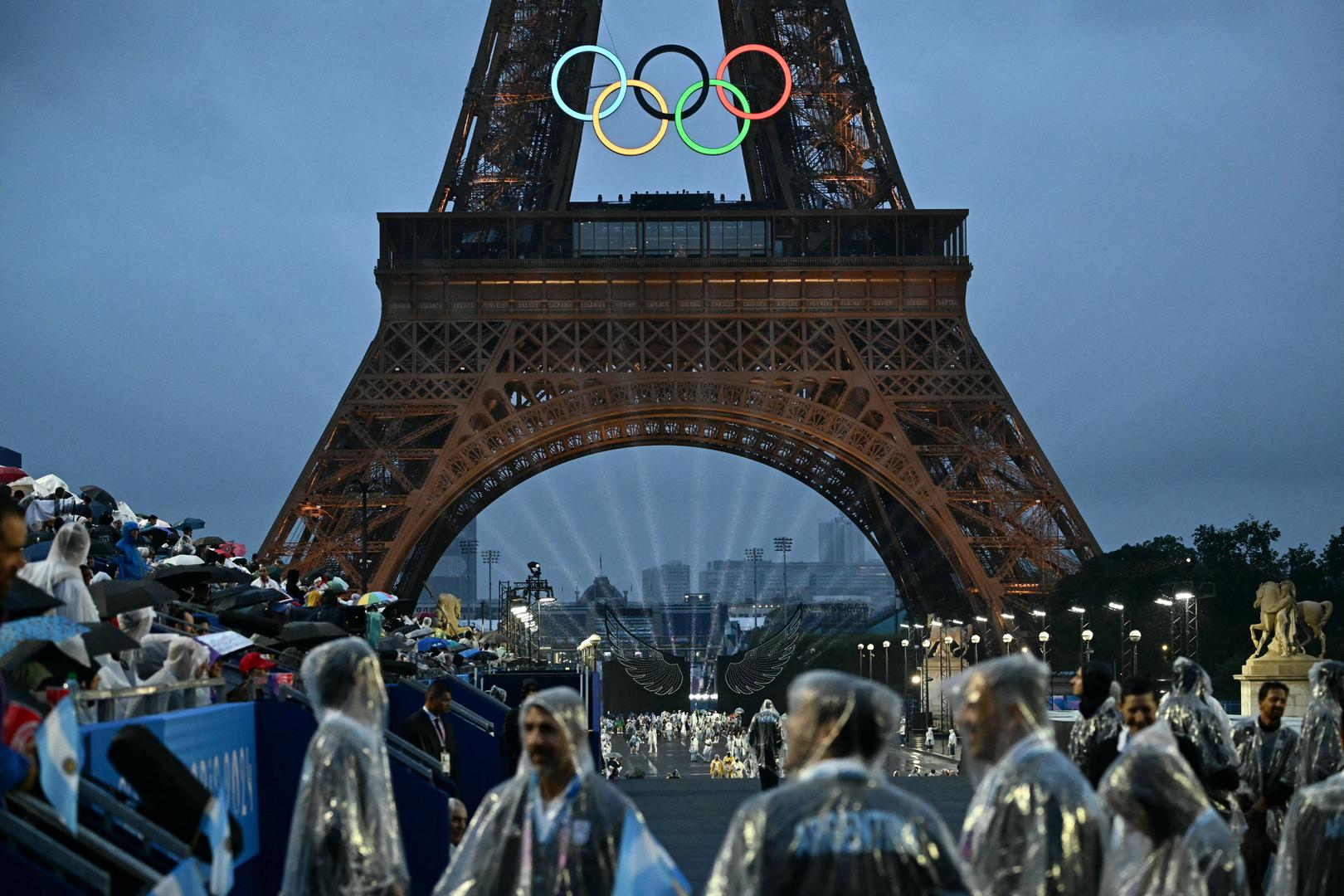 Paris 2024 Olympics - Opening Ceremony - Paris, France - July 26, 2024. Delegations arrive at the Trocadero during the opening ceremony of the Paris 2024 Olympic Games in Paris on July 26, 2024 with the Eiffel Tower in the background.     LOIC VENANCE/Pool via REUTERS Photo: LOIC VENANCE/REUTERS